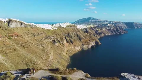 4k Aerial drone footage flying over Skaros rock Santorini Greece Stock Footage 144938665