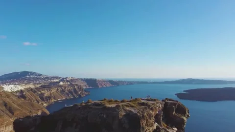 4k Aerial drone footage flying over Skaros rock Caldera Santorini Greece Stock Footage 144939942
