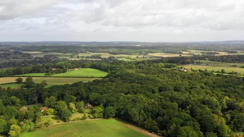 4K aerial drone footage flyover english country landscape deciduous summer Stock Footage 95208253