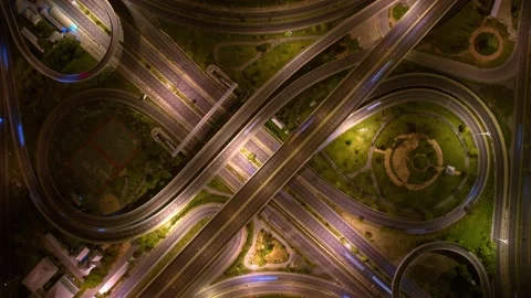 4K : Aerial drone hyperlapse video of elevated toll road junction Stock Footage 171261695