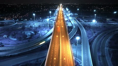 4K : Aerial drone hyperlapse video of elevated toll road junction Stock Footage 171261825