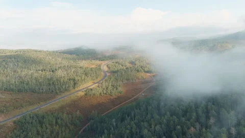 4K Aerial Drone Low Clouds Over Forest Road - 1 of 2 Video stock 160998495