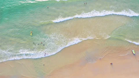 4K Aerial drone moving top view crowd people at tropical Beach with sunset in Stock Footage 155084443