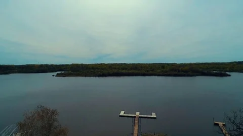 4K Aerial Drone Pass Over Water in Wonder Lake Illinois Stock Footage