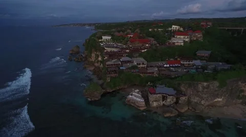 4K Aerial Drone Pull Back Shot of Single Fin Bar in Uluwatu Bali Indonesia Vídeo Stock 64164235