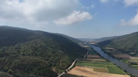 4K Aerial Drone  River Valley, Mountain Slopes and Passing Clouds Stock Footage 341530177