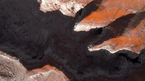 4K Aerial Drone Shot Deep Red Dry Canyon Gorge and Desert Varnish Rock Vídeos de archivo 334446647