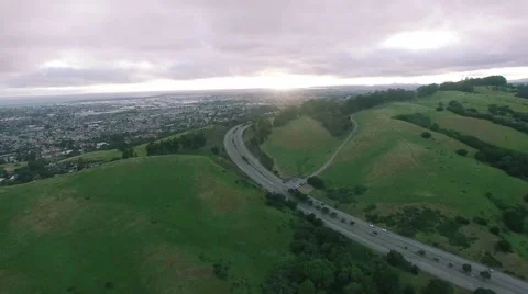 4K Aerial drone shot east bay toward sunset along road Vídeo Stock 63143653