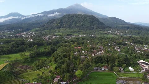 4K aerial drone shot of Mount Welirang rice terraces East Java Indonesia Stock Footage 332122571