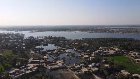 4K Aerial Drone Shot of a Remote Flooded Village in Sindh, Pakistan Stock Footage 304435348