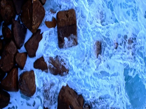 4k aerial drone shot of waves splashing against rocks, at Spanish Atlantic coast Stock Footage 72274192
