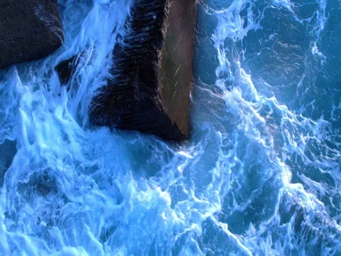 4k aerial drone shot of waves splashing against rocks, at Spanish Atlantic coast Stock Footage 72276771