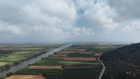 4K Aerial Drone Timelapse of River Delta, Farmland Fields and Moving Clouds Stock Footage 341529355