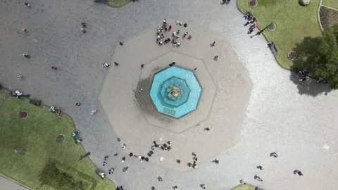 4K Aerial Drone Top Down Rise and Rotate over fountain at city square Stock Footage 239835284