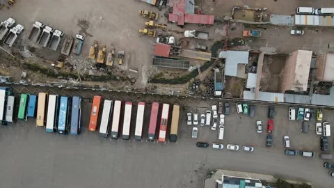 4K Aerial Drone Top Down view of Construction Site and Bus Parking Lot Stock Footage 239835334
