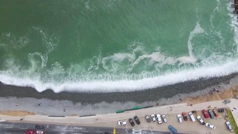 4K Aerial Drone Top Down Descend over Rocky Beach in Lima, Peru Stock Footage 239835530
