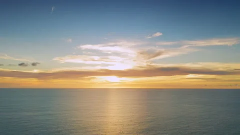 4K Aerial drone top view Beautiful sunset over the tropical beach with clouds Stock Footage 157106982
