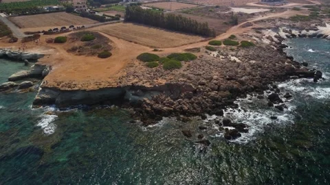 4K aerial drone video of waves, crystal clear water, rocky beach, Cyprus Stock Footage 237343833