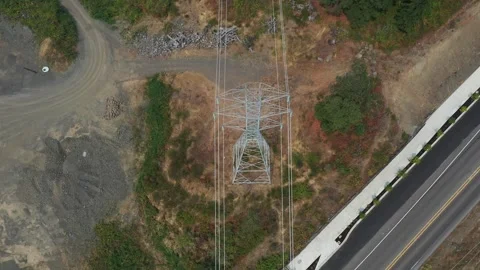 4K aerial drone view of a high voltage power transmission tower electrical lines Stock Footage 341724161