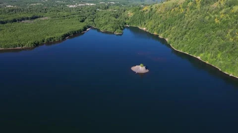 4K aerial drone view of islet in Coldwater Lake near Mt Saint Helens Washington  Stock Footage 337820358