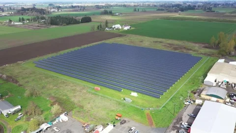 4K aerial drone view of a large solar panel farm in field in rural Oregon, USA  Stock Footage 332120482