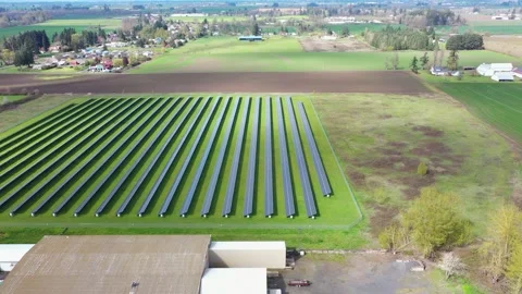 4K aerial drone view of a large solar panel farm in field in rural Oregon, USA  Stock Footage 332120580
