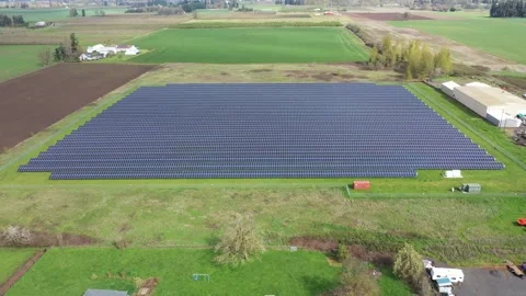 4K aerial drone view of a large solar panel farm in field in rural Oregon, USA  Stock Footage 332120673