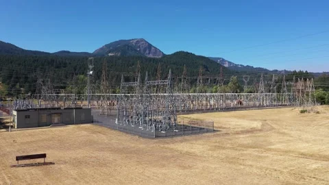 4K aerial drone view of large electrical substation at Bonneville Dam, WA, USA  Video stock 342585960