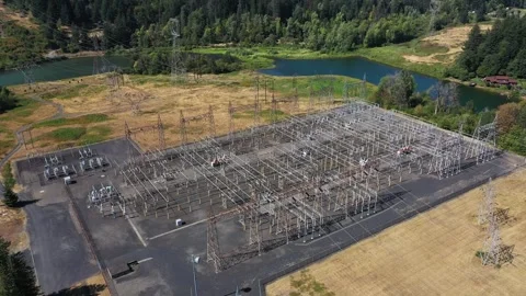 4K aerial drone view of large electrical substation at Bonneville Dam, WA, USA  스톡 동영상 342586392
