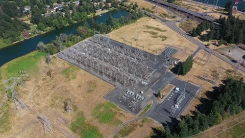 4K aerial drone view of large electrical substation at Bonneville Dam, WA, USA  스톡 동영상 342586758