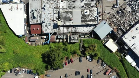4K aerial drone view of large aerospace metal manufacturing, casting factory USA Stock Footage 345625313