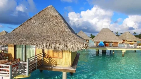 4k aerial drone view on luxury bugalow house hotel in tropical Bora Bora islands Stock Footage