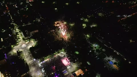 4K Aerial Drone View of Massive Crowd Dancing at Outdoor Night Music Festival Stock Footage 340273231