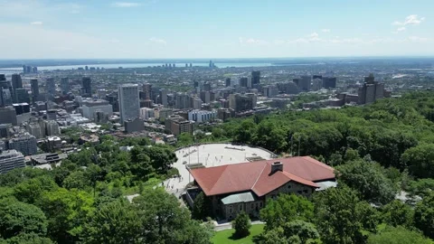 4K aerial drone view from Mount Royal overlooking Montreal skyline Stock Footage 332626148