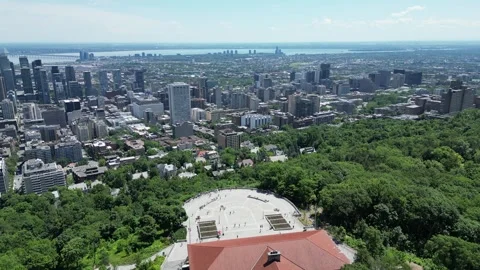 4K aerial drone view of  Mount Royal overlooking Montreal skyline Stock Footage 332626230