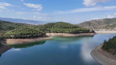 4K aerial drone view. Reflection of the cloud over the lake water. Stock Footage 286994309