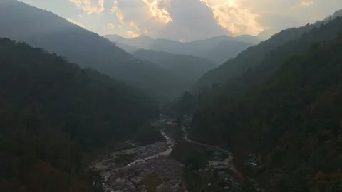 4K aerial drone view of a river through the Himalayan mountains of Sikkim. Stock Footage 341973115