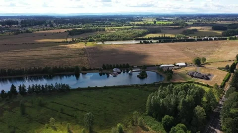 4K aerial drone view of small Warman lake, residential homes in Camas, WA, USA Stock Footage 342808895