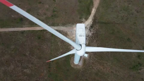 4K aerial drone view of a wind turbine. Close-up of the propeller from above. Stock Footage 132255790