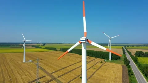 4K aerial drone view of a wind turbine. Close-up of the propeller from above. Stock Footage 176707300