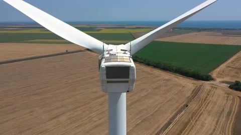 4K aerial drone view of a wind turbine. Close-up of the propeller from above Stock Footage 178982409