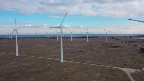 4K aerial drone view of a wind turbine. Windmill for electric power production Stock Footage 261797030