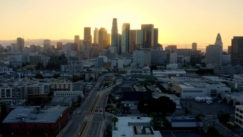 4K aerial of empty Downtown LA skyline silhouette at sunset during the Stock Footage 129363266