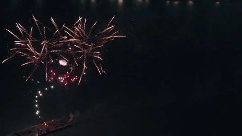 4K Aerial Fireworks Launch Barge with Corpus Christi T-Heads and Bayfront Stock Footage 339318126
