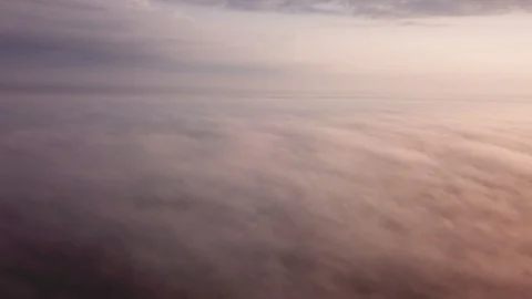4k aerial flight over clouds at summer sunrise. Beautiful drone landscape 動画素材 93967586