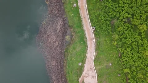 4K Aerial Flight Over Mirror Lake Revealing Green Island and Reeds Stock-Footage 335782777