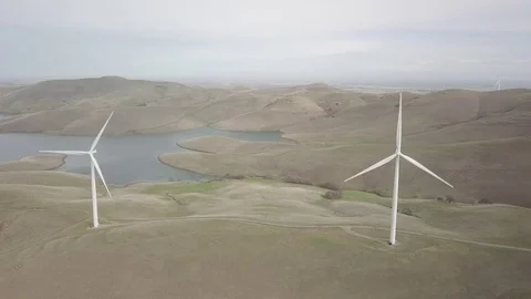 4k Aerial Fly Between Two Windmills Stock Footage 84936296