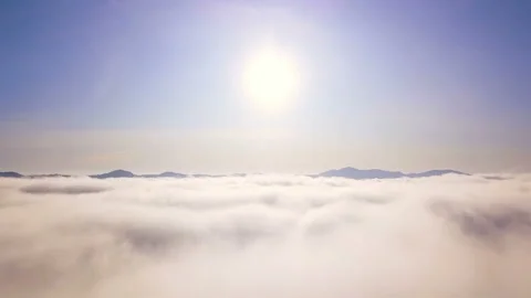 4K .Aerial. Fly over clouds and sun on sky, mountain area. Amazing landscape 库存影片 120467047