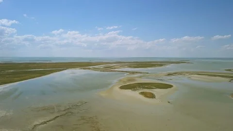 4K  Aerial. Fly  up over  drying up sea,  lake. Summer hot time Stockbeeldmateriaal 91756343