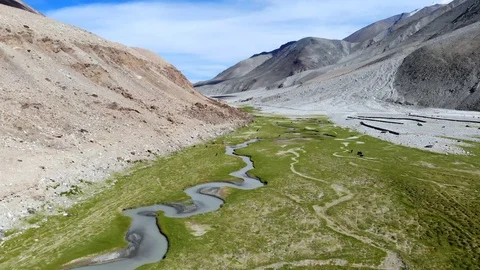 4k aerial fly over river in high altitude valley in Ladakh in India Stock Footage 107618054